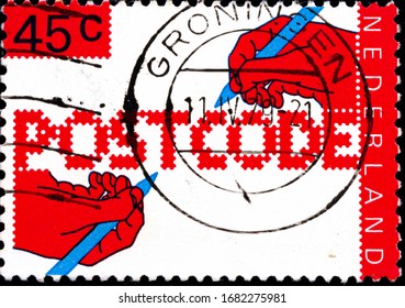 02 11 2020 Divnoe Stavropol Krai Russia Postage Stamp Netherlands 1978 The Introduction Of Postal Codes Postcode Word Written In A Zip Code Style