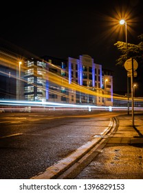 02/04/2019 Portsmouth, Hampshire, UK light trails from cars moving at night 
 - Shutterstock ID 1396829153