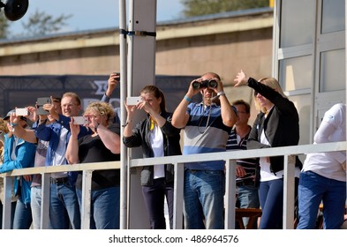 02.09.2016.Russia.Saint-Petersburg.Spectators Watch The Regatta.Someone Looking Through Binoculars.