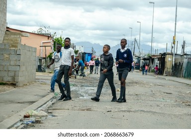 02.11.2021 Wallace Dene Township, Cape Town - School Teenagers Walk In A Street