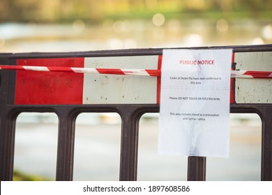 02,12,2020, Blackpool, England, Public Notice Cases of avian flu have been confirmed in this area. Please do not touch or feed the birds. This area remains closed. Sign infant of blocked park 