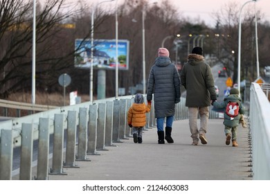 02.15.2022 Wroclaw, Poland, People In Winter Clothes On A Spencer In The City.