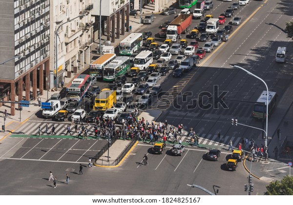 02/26/2019, Buenos Aires, Argentina - Aerial
view of Libertador avenue, city of Buenos Aires. Buildings, cars,
and people walking the
streets.
