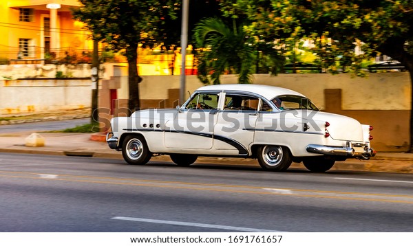03. 03. 2020. Havana, Cuba. Cars on the vibrant\
city`s streets.