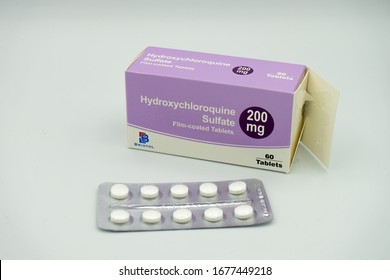 03/19/2020 Portsmouth, Hampshire, UK A Box Of Hydroxychloroquine Tablets With The Tablets In A Packet In Front Also Known As Chloroquine Or Plaquenil