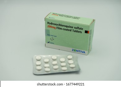 03/19/2020 Portsmouth, Hampshire, UK A Box Of Hydroxychloroquine Tablets With The Tablets In A Packet In Front Also Known As Chloroquine Or Plaquenil