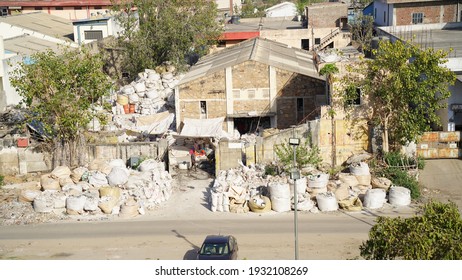 04 March 2021-Metro City, Jaipur, India. Ancient Factory Of White Cement Near Jaipur Rajasthan. Plastic Sacs Full Of White Cement.