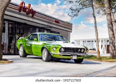 04.02.2021 California, USA. Retro Muscle Car Chevrolet Camaro Light Green Color Near The Building. Sunny Weather.