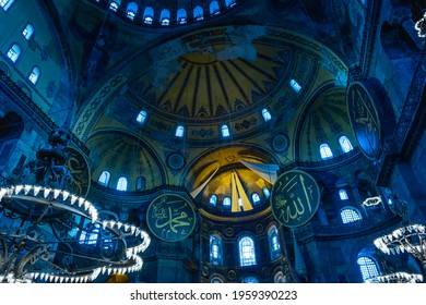 04.05.2021 - Istanbul, Turkey: blue view of interior of Hagia Sophia mosque dome with blue Muslim ornaments. Translation of signs with Arabic calligraphy: Allah and Muhammed 