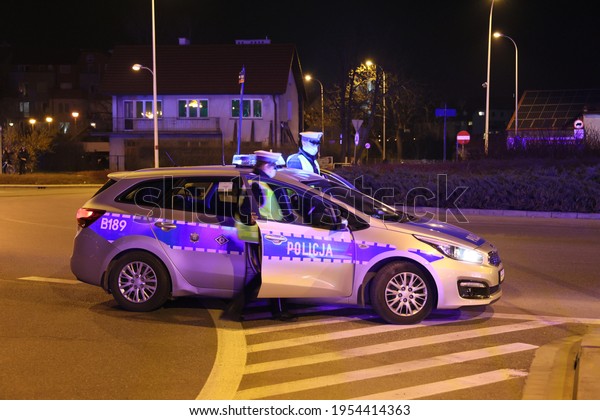 04.10.2021, Wrocław, Poland, Police cars\
securing a sports event in\
Wrocław.