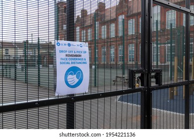 04-11-2021 Portsmouth, Hampshire, UK A Sign On The Gates Of A British School Showing The Ruled When Dropping Off Children During The Coronavirus Pandemic