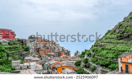 Similar – Image, Stock Photo Manarola is one of the most beautiful villages in Italy. The Cinque Terre is a rugged coastline of the Ligurian Riviera and is made up of five beautiful hilltop villages.