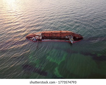 05.07.2020 Odessa, Ukraine. The sunken tanker Delfi was swept into the sea by a storm and sailed to the shores of the Black Sea in Odessa. - Shutterstock ID 1773574793