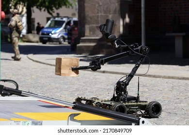 05.15.2022 wroclaw, poland, A police miner defuses a bomb with an automatic robot.