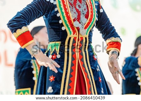 06 July 2021, Ufa, Russia: National Bashkir women dance in traditional clothes at the international festival Folkloriada