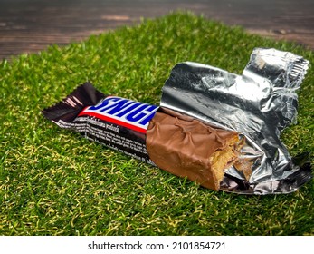 06-01-2022 Seremban Malaysia, Snickers Chocolate Bar On Artificial Grass Made By Mars Inc.