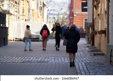 06-03-2020 Riga, Latvia People Walking In City Park.