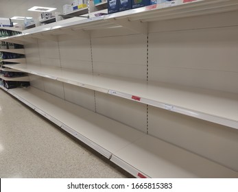 06/03/2020 - Street, Somerset, United Kingdom - Empty Toilet Paper Shelves In Sainsbury's Supermarket