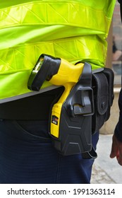 06.13.2021 Wroclaw, Poland, A Policeman On Duty With An Electric Stun Gun.