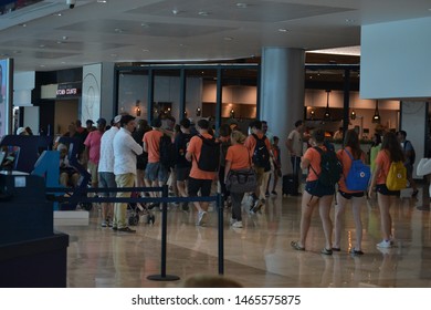 Cancún/Mexico- 06/29/2019: A Group Of High School Students On A Trip Walk Through Cancún International Airport.