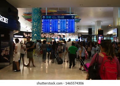 Cancún/Mexico- 06/29/2019: Passengers Walk Through A Terminal At Cancún International Airport