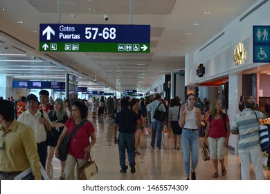 Cancún/Mexico- 06/29/2019: Passengers Walk Through A Terminal At Cancún International Airport