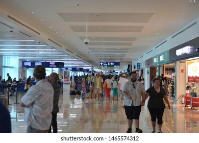 Cancún/Mexico- 06/29/2019: Passengers Walk Through A Terminal At Cancún International Airport