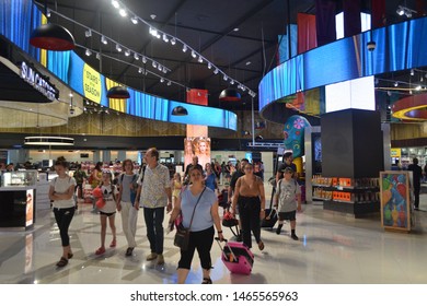 Cancún/Mexico- 06/29/2019: Ticketed Passengers Walk Through Duty Free Shops At Cancún International Airport