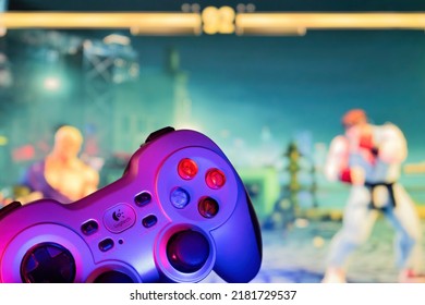 İstanbul, Türkiye - 07 23 2022 : Logitech F710 Gamepad In Front Of Street Fighter V Game With Blurred Background, 