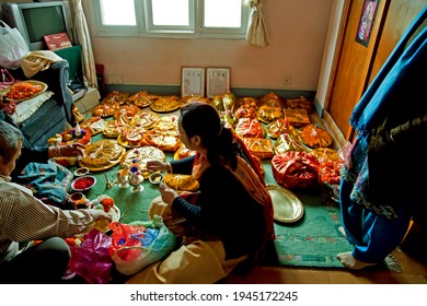 07-03-2014 – 13:37:49 Preparation For Marriage In A House, Ladies Wings Busy Packing  Gift Articles To Accompany The Bride-groom At Kathmandu, Nepal