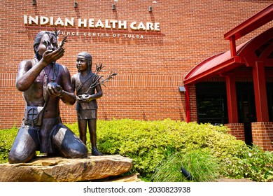 07-20-2021 Tulsa OK USA Statues Of Indian Man And Child Planting Trees Outide Of Indian Health Care Resource Center