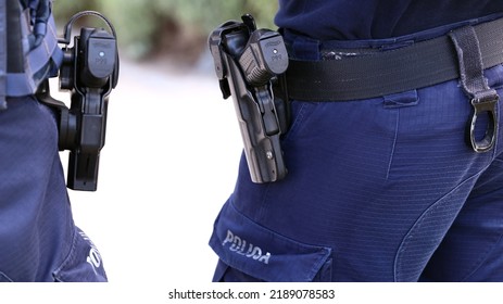 08.01.2022 Wroclaw, Poland, The Pistol In A Holster On The Patrol Officer Belt.