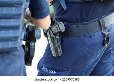 08.01.2022 Wroclaw, Poland, The Pistol In A Holster On The Patrol Officer Belt.