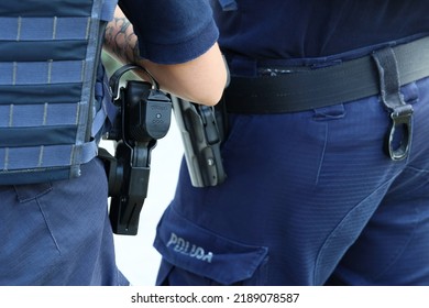 08.01.2022 Wroclaw, Poland, The Pistol In A Holster On The Patrol Officer Belt.