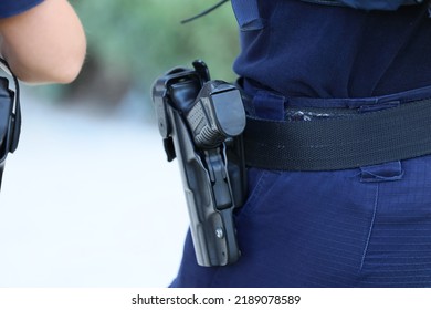 08.01.2022 Wroclaw, Poland, The Pistol In A Holster On The Patrol Officer Belt.