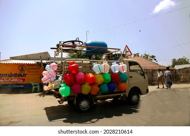 08-03-2015  A Two-tire Mini Truck, And Many Plastic Containers Hanging On The Outer Side Of It For Transportation Seen While Going To Kanyakumari From Rameswaram By Road, Tamil Nadu, India