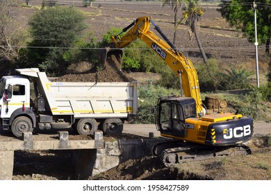 08-05-2020,Bhadapipalya, Madhya Pradesh, India. The modern excavator JCB performs excavation work on the construction site