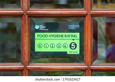 08/09/2020 Portsmouth, Hampshire, UK A Food Hygiene Rating Sicker With A Rating Of 5 In The Window Of A Restaurant Or Takeaway