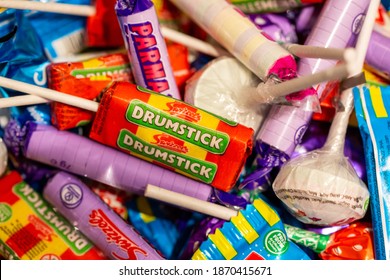 08-12-2020 Portsmouth, Hampshire, UK A Selection Of Retro Sweets Close Up With The Focus On A Drumstick Lolly