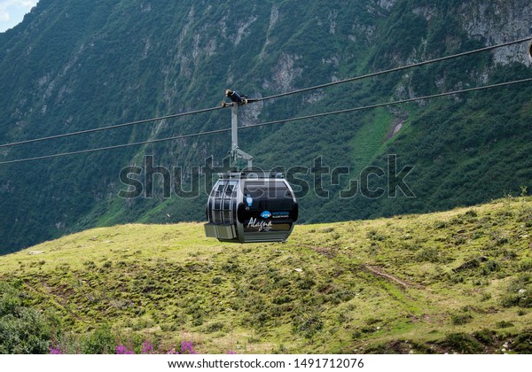 08.21.2019 Alagna, Italy \
A scenic cable car flying\
over a Alagna town, famous for tourist attraction, snow sport\
activities, rafting\
.