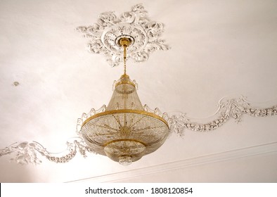 08/28/2020. Humenné Crystal Chandelier In Gilded Frame With Rosette Ceiling In The Vihorlát Museum. The Renaissance Building Offers A Look Back At The Culture Of The Nobility.