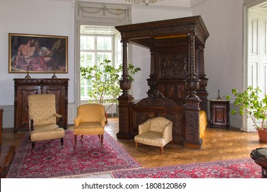 08/28/2020. Humenné Wooden Carved Antique Canopy Bed With Coat Of Arms. The Renaissance Building Offers A Look Back At The Culture Of The Nobility From The Renaissance To The 20th Century.