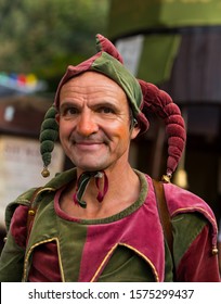 09 August 2019, Jester Man Smiling During A Medieval Event 