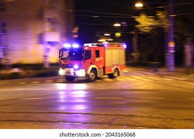 09.16.2021 Wroclaw, Poland, Red Fire Brigade Car On Alarm Signal For A Fire.