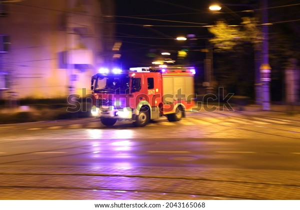 09.16.2021 wroclaw, poland, Red Fire brigade car on\
alarm signal for a\
fire.