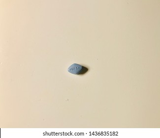 1 Blue Viagra Pill Stands On White Background.