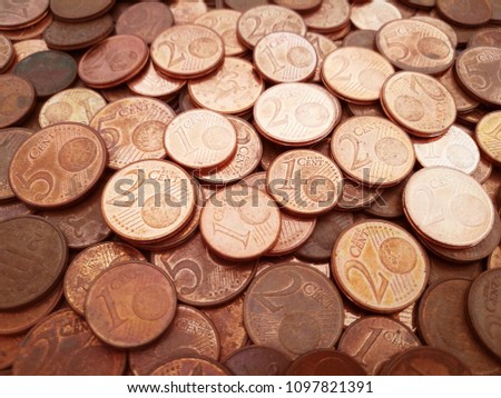 1 cent euro coins, 2 cent euro coins and 5 cent euro coins. Pile of euro cent coins.