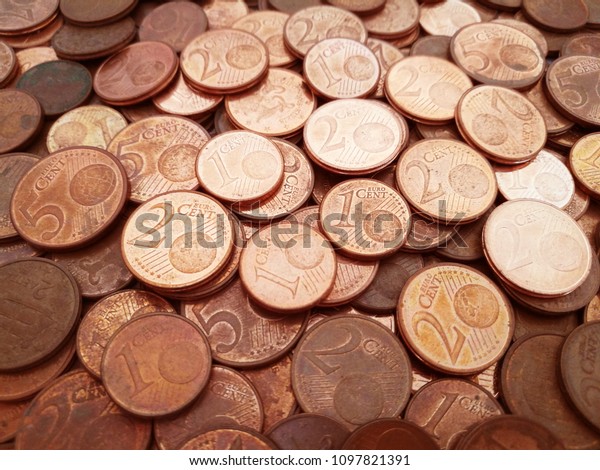 1 cent euro coins, 2 cent euro coins and\
5 cent euro coins. Pile of euro cent\
coins.