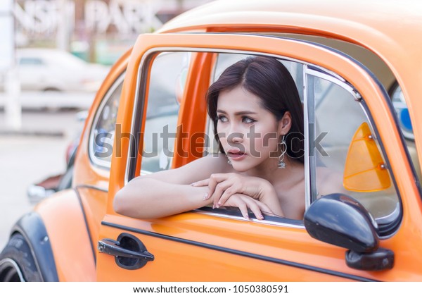 1 Febuary 2018 ,
Udon Thani Thailand, Attractive woman sitting in the car. Beautiful
woman relaxing in car.