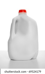 1 Gallon Of Milk In A Milk Carton On A Shiny Table With White Background.